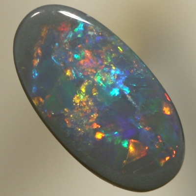 SOLID SEMI BLACK OPAL Sparkling red, orange and green move brightly